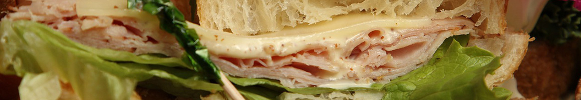 Eating Sandwich at Irish Bros Roasters restaurant in Portland, OR.